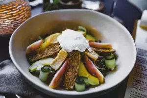 Crunchy veggie sticks and hummus in a bowl