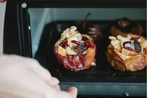 Homemade trail mix with nuts and dried fruits being prepared